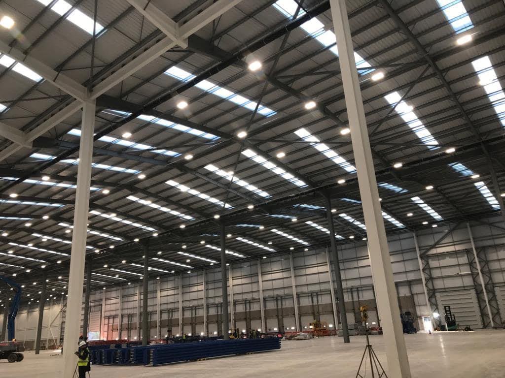 new-build warehouse electrical installation, high-bay lighting between the columns